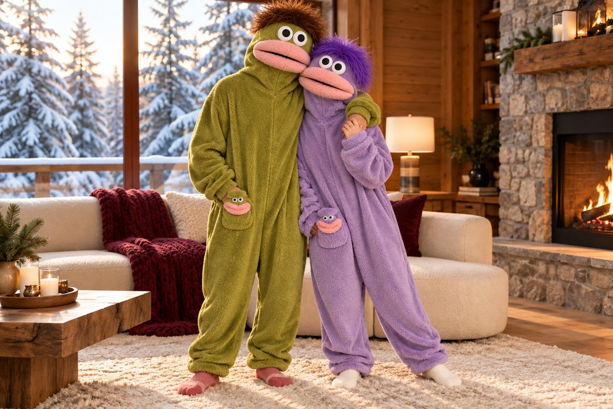 FUZMO couple scene showing full closed monster head cover and body-attached lower lip — styled campaign